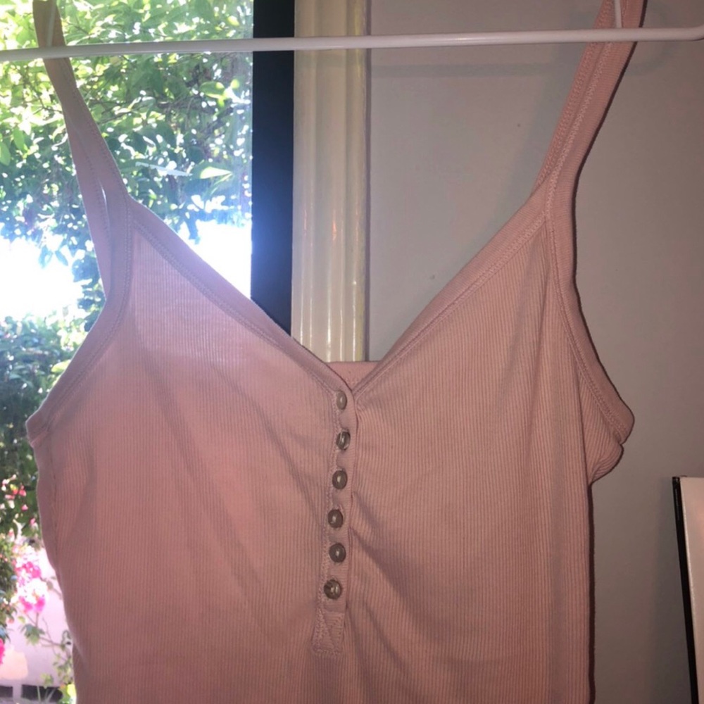 Soft and comfortable light pink/peach tank top!